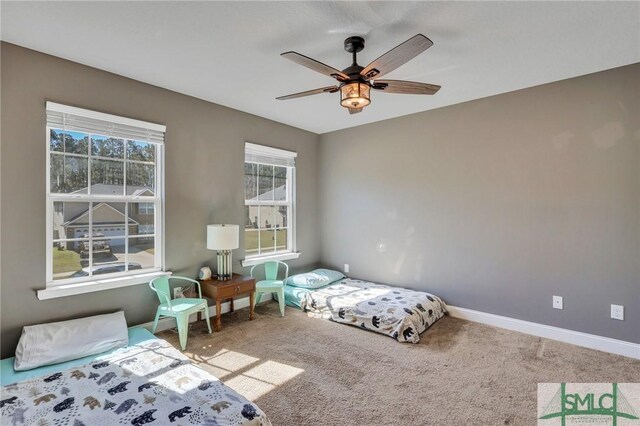 469 Nashview Trl, Allenhurst, GA 31301 - bedroom featuring carpet floors, ceiling fan, and baseboards