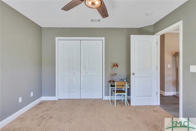 469 Nashview Trl, Allenhurst, GA 31301 - bedroom with light colored carpet, a closet, visible vents, and baseboards