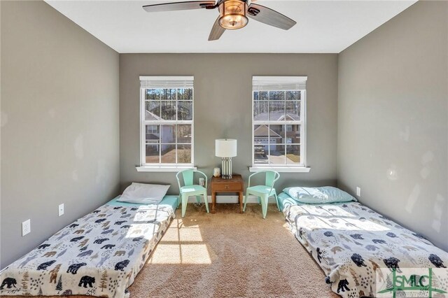 469 Nashview Trl, Allenhurst, GA 31301 - carpeted bedroom with a ceiling fan