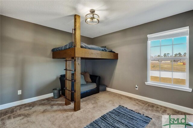 469 Nashview Trl, Allenhurst, GA 31301 - bedroom featuring light colored carpet and baseboards