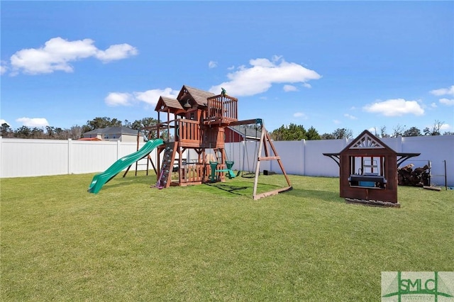 469 Nashview Trl, Allenhurst, GA 31301 - view of playground featuring a fenced backyard and a yard