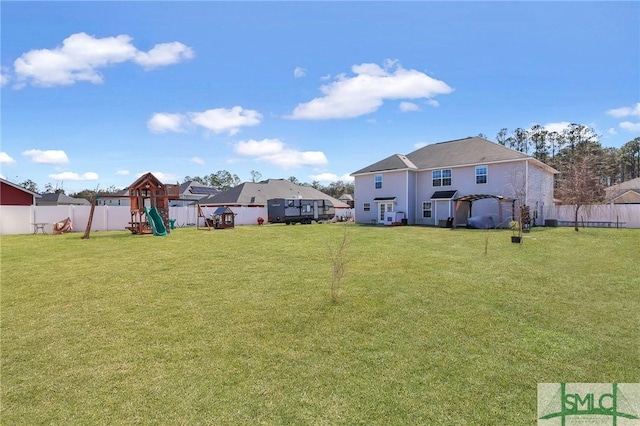 469 Nashview Trl, Allenhurst, GA 31301 - view of yard featuring a playground and a fenced backyard