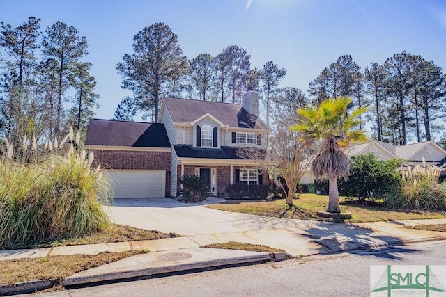 view of front of house featuring a garage, a chimney, concrete driveway, and brick siding