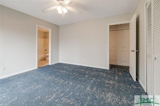 unfurnished bedroom with a closet, dark carpet, baseboards, and ceiling fan