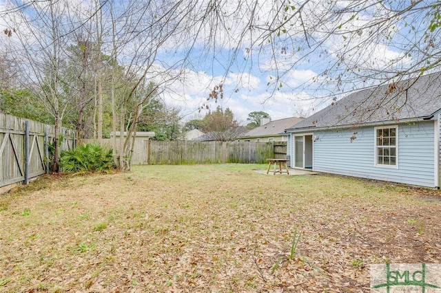 view of yard featuring a fenced backyard