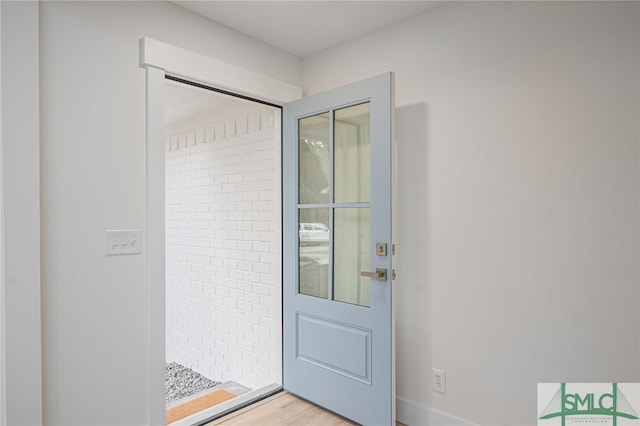 entryway with light wood-style flooring