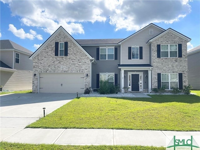 view of front of house featuring a garage, driveway, brick siding, and a front lawn