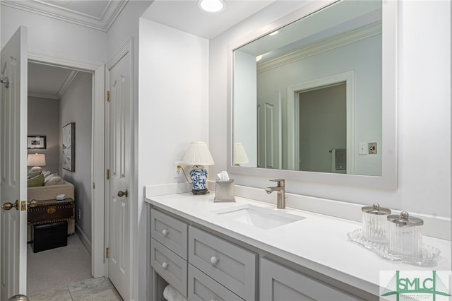 bathroom with ensuite bath, crown molding, and vanity