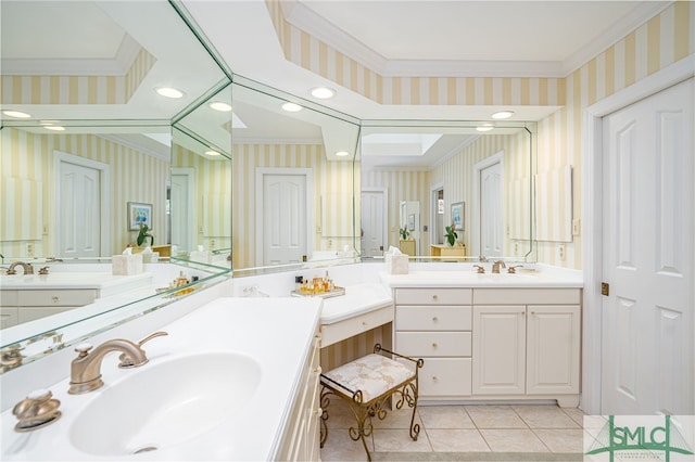 full bath featuring ornamental molding, a sink, and wallpapered walls