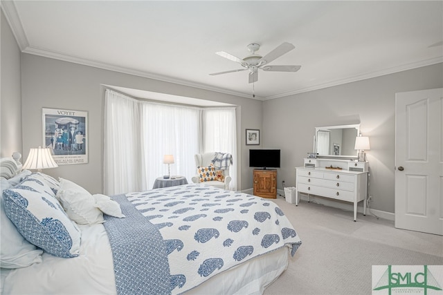 bedroom featuring light carpet, ornamental molding, a ceiling fan, and baseboards