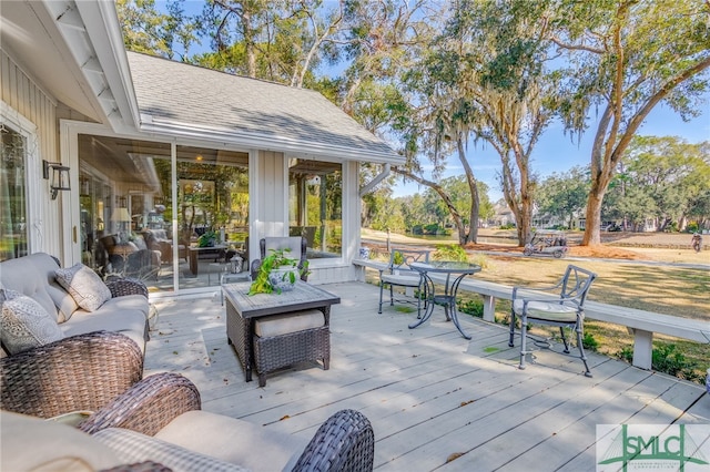 deck featuring an outdoor living space