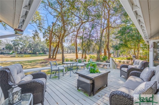 deck featuring an outdoor living space