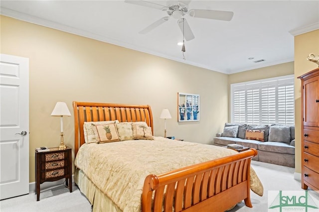 bedroom featuring visible vents, ornamental molding, a ceiling fan, and light colored carpet