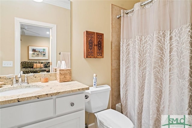 full bathroom with shower / tub combo, vanity, toilet, and ensuite bathroom