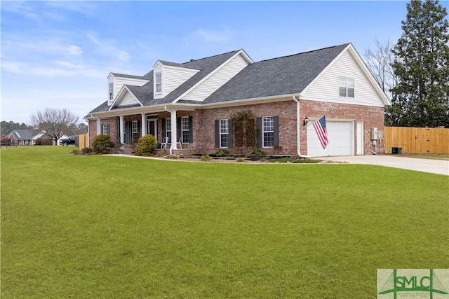 new england style home featuring driveway, brick siding, an attached garage, fence, and a front yard