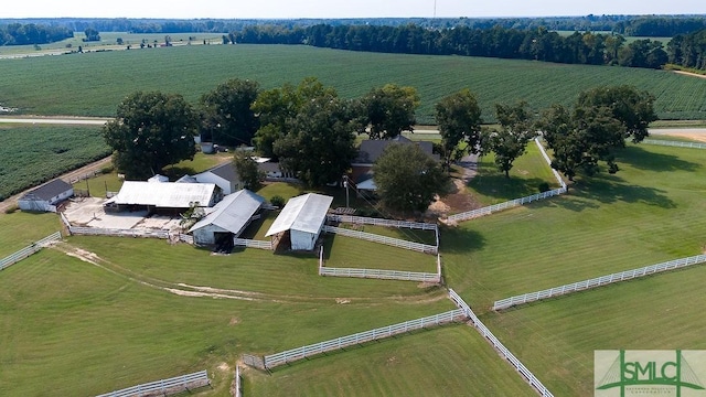 birds eye view of property featuring a rural view