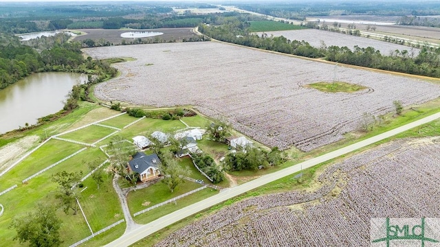 aerial view featuring a rural view and a water view