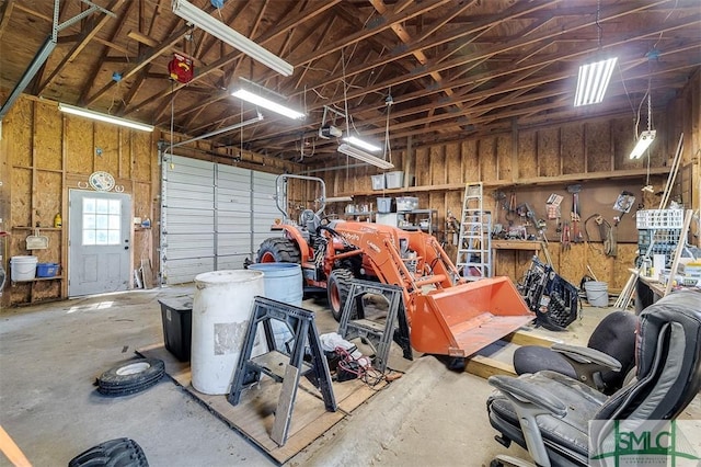 garage with a workshop area