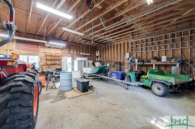 garage with a workshop area