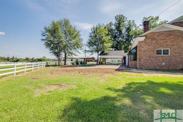 view of yard with fence