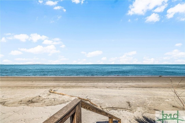 property view of water featuring a view of the beach