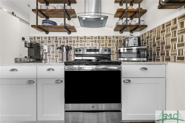 kitchen with appliances with stainless steel finishes, white cabinetry, and open shelves