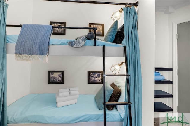 bedroom featuring ornamental molding