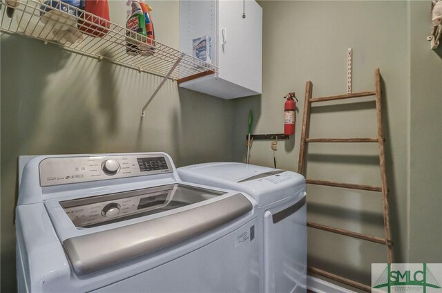 clothes washing area with laundry area and independent washer and dryer