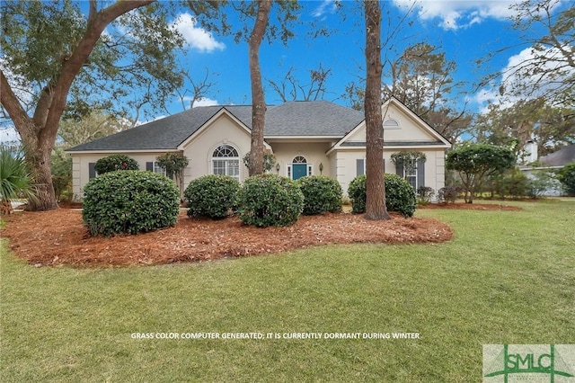 view of front of house with a front lawn and stucco siding