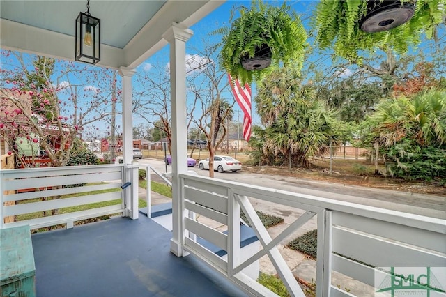 balcony featuring a porch