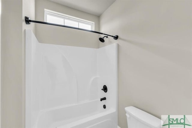 full bathroom with shower / washtub combination and toilet