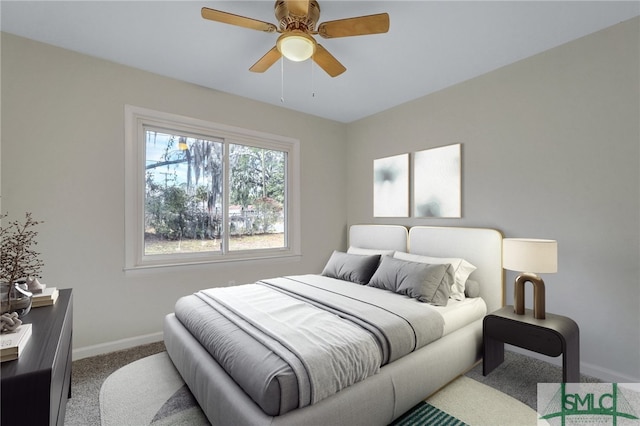 bedroom with carpet flooring, baseboards, and ceiling fan