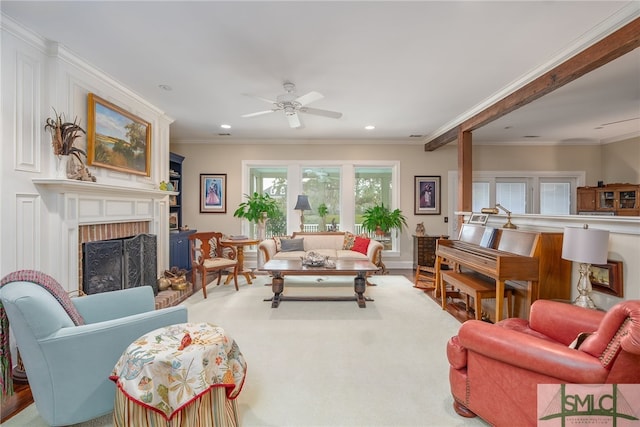 living room with crown molding, recessed lighting, a fireplace, and ceiling fan