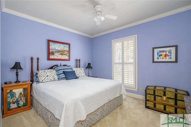 bedroom with ornamental molding, light colored carpet, ceiling fan, and baseboards