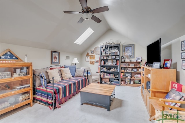 bedroom featuring a ceiling fan, carpet, visible vents, and vaulted ceiling with skylight