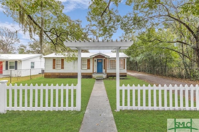 bungalow-style home with a fenced front yard and a front yard