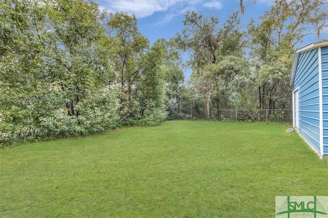 view of yard featuring fence