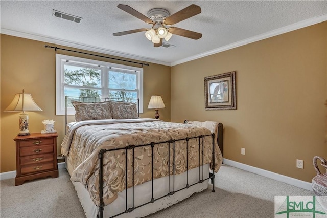 bedroom featuring visible vents, crown molding, and light carpet