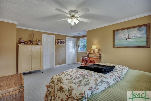 bedroom with crown molding, light colored carpet, a ceiling fan, a textured ceiling, and baseboards