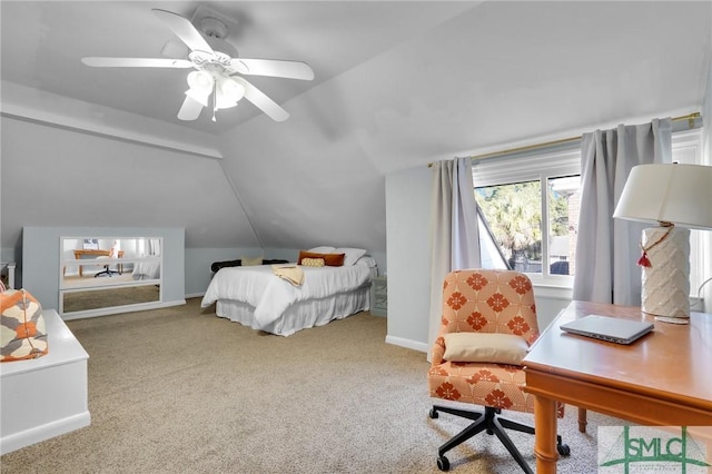 carpeted bedroom with lofted ceiling, a ceiling fan, and baseboards