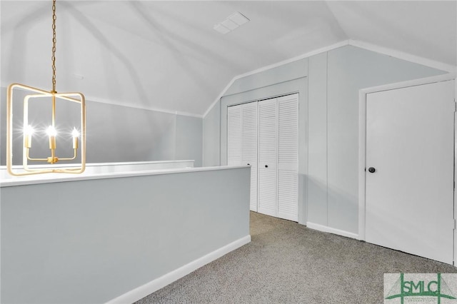 bonus room featuring carpet floors, baseboards, and lofted ceiling