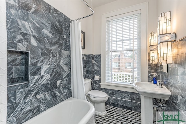 bathroom featuring shower / bathtub combination with curtain, tile walls, and toilet