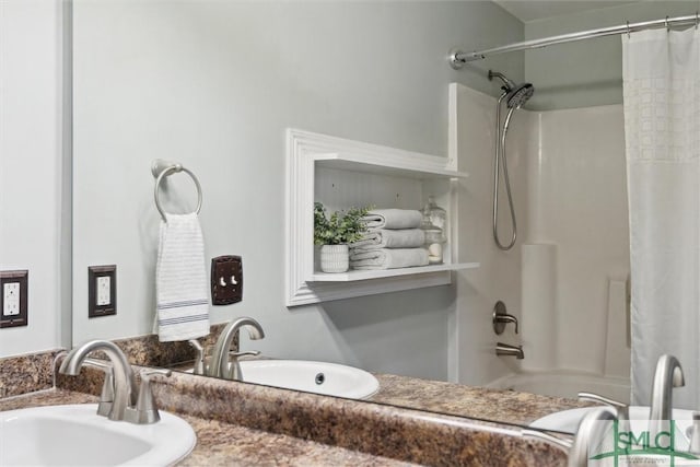 bathroom featuring shower / bath combo and a sink