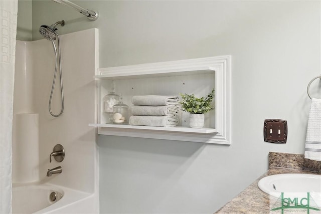 full bathroom with shower / bath combo and a sink