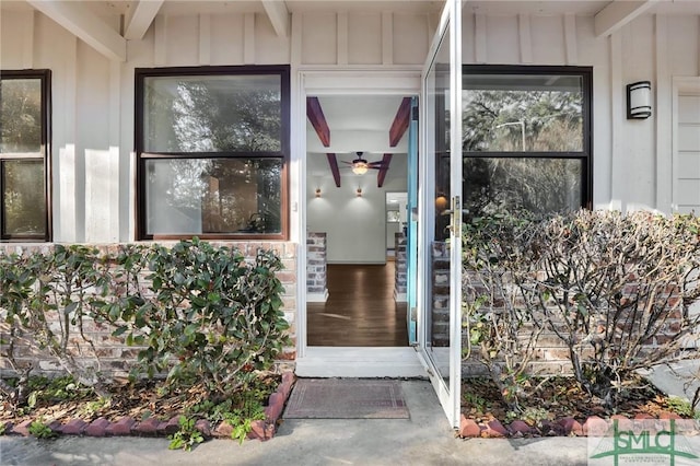 entrance to property featuring board and batten siding