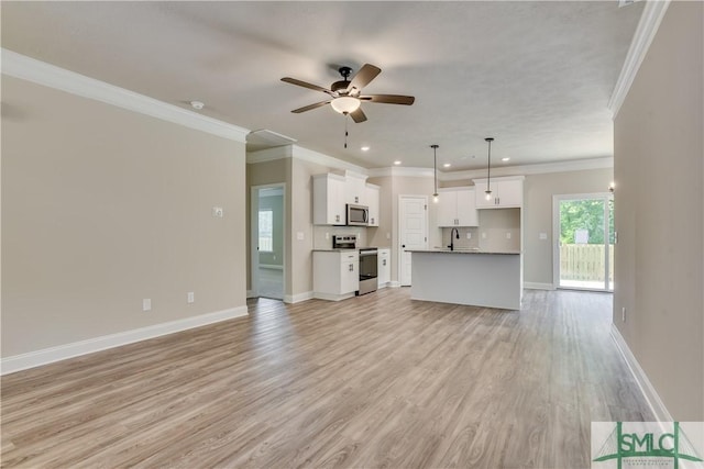 unfurnished living room featuring light wood-style floors, a sink, baseboards, and ceiling fan