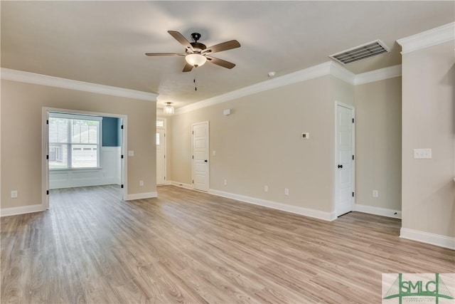 unfurnished living room featuring baseboards, visible vents, and light wood-style floors