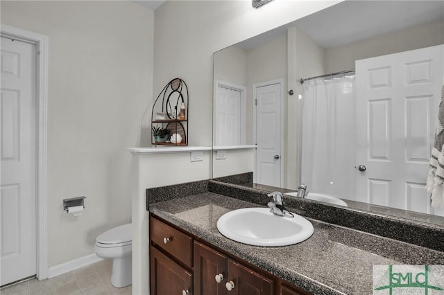 full bathroom featuring baseboards, toilet, curtained shower, tile patterned flooring, and vanity