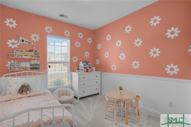 bedroom with carpet and visible vents