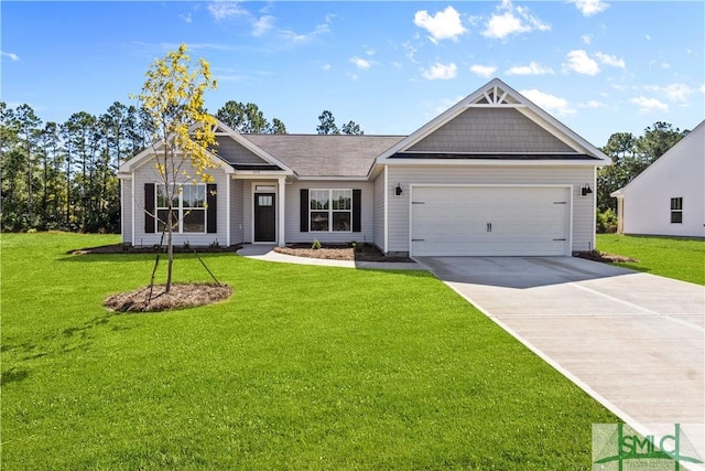 view of front facade with a garage, a front yard, and driveway